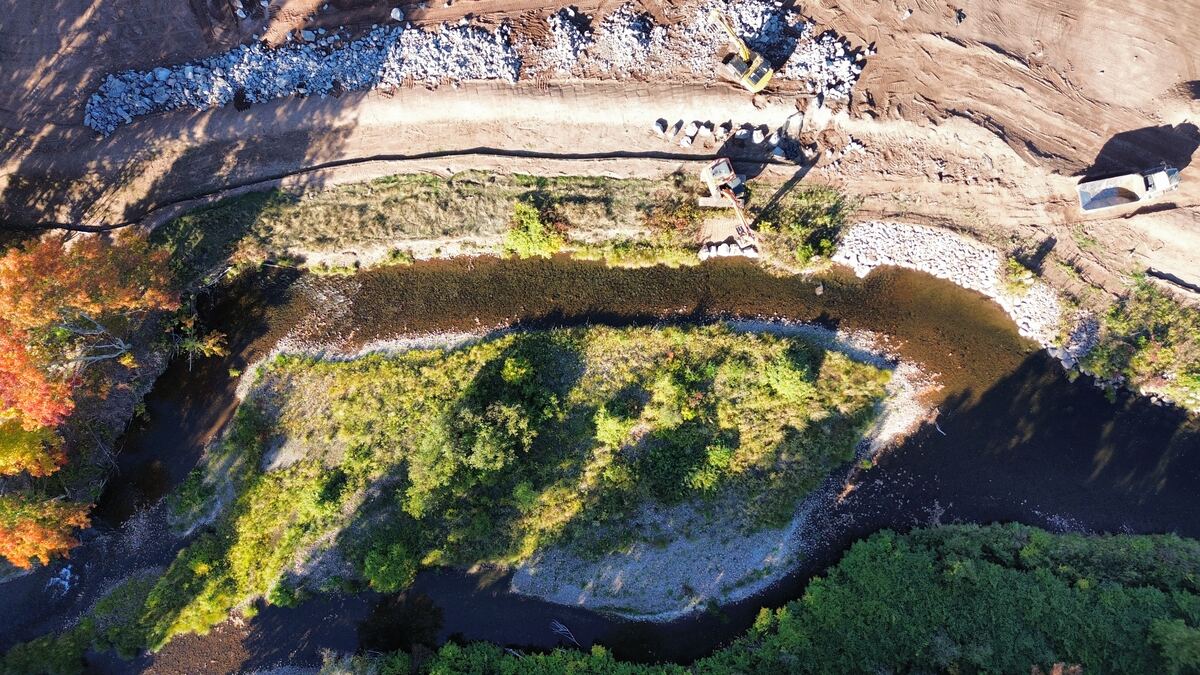 Drone view of riverbank restoration under construction